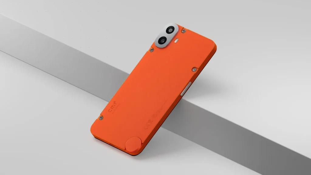 Nothing CMF Phone 1, in Orange, leaning on a step