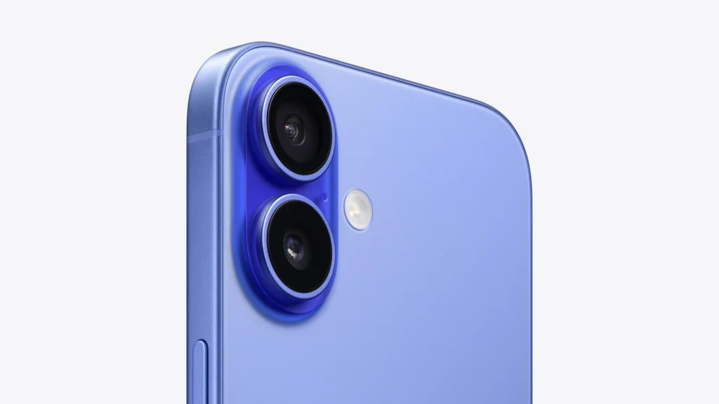 Apple iPhone 16, in Ultramarine, close-up of the dual rear cameras