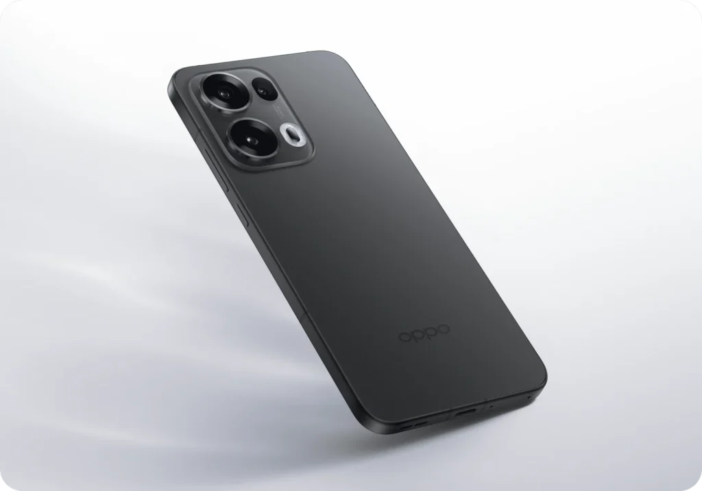 OPPO Reno13 Pro 5G, in Graphite Grey, on a pale background
