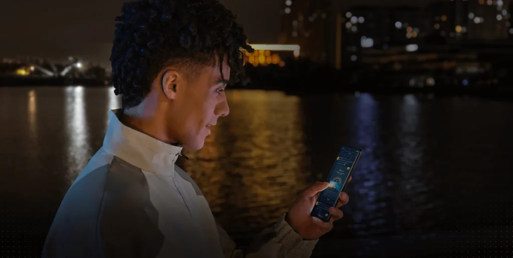 Poco X7, used at night by the water