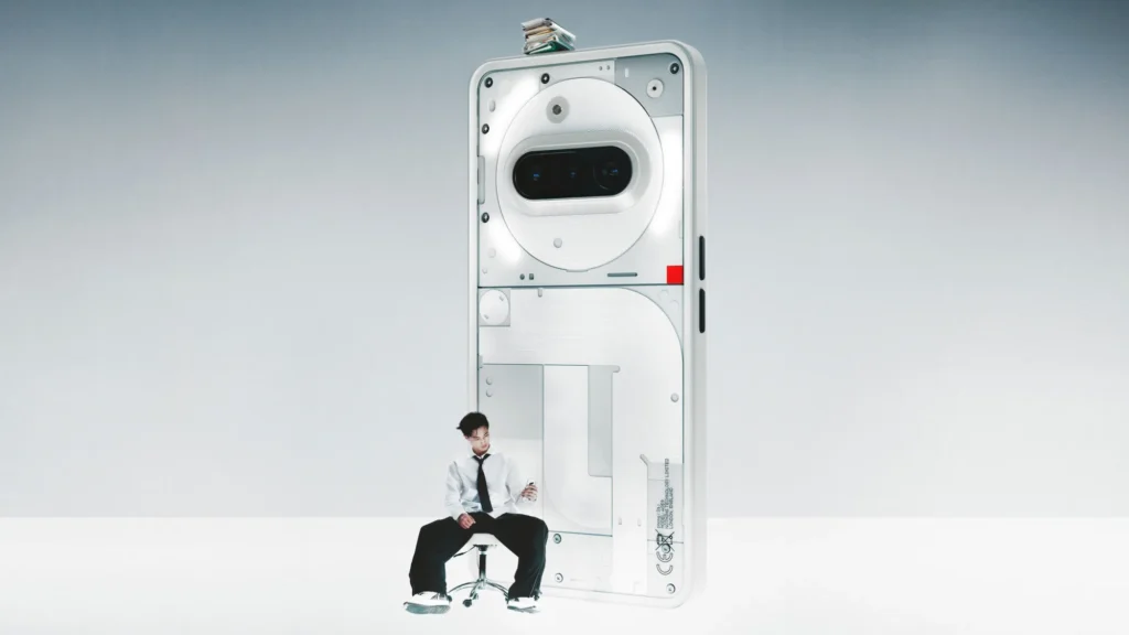 Nothing Phone (3a), in White, with a person seated in front of it