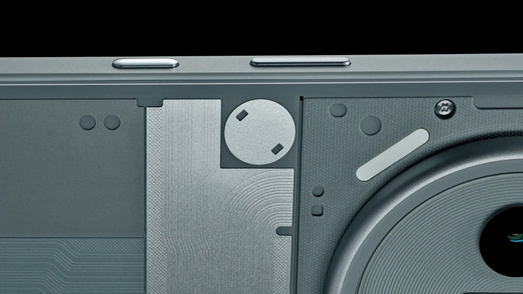Nothing Phone (3a) Pro, the side buttons and transparent back in Grey, close up