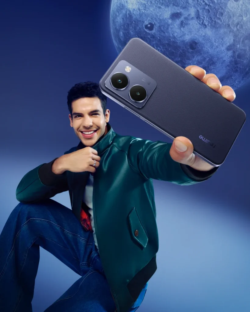 realme P3 Ultra 5G, in Neptune Blue, held up by a man