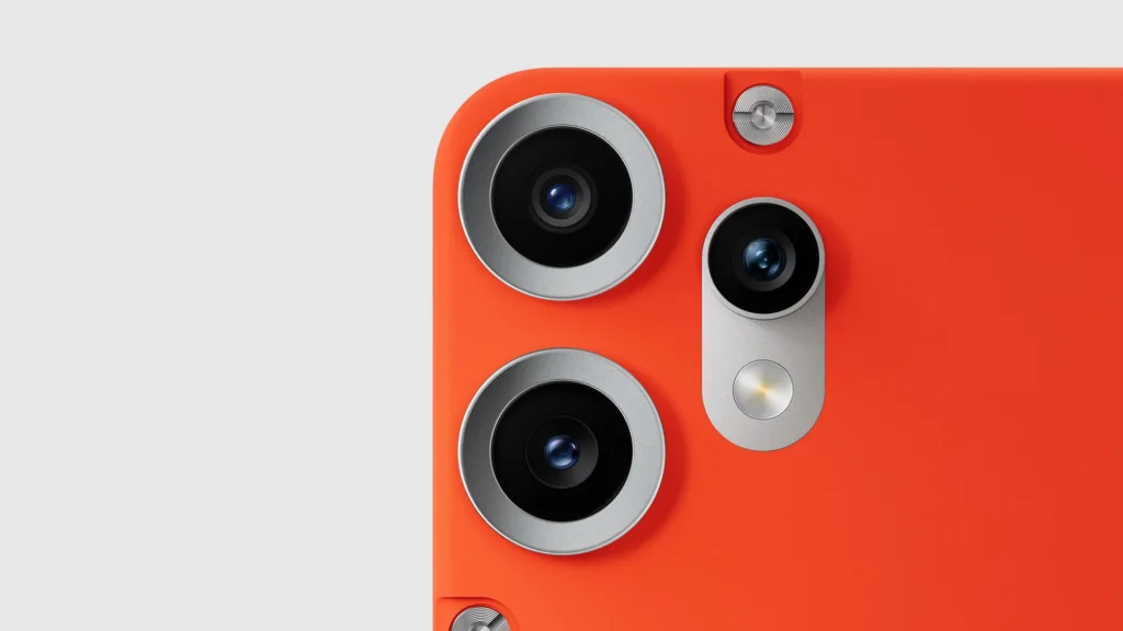 Nothing CMF Phone 2 Pro, the triple rear cameras and exposed screws in Orange, close up