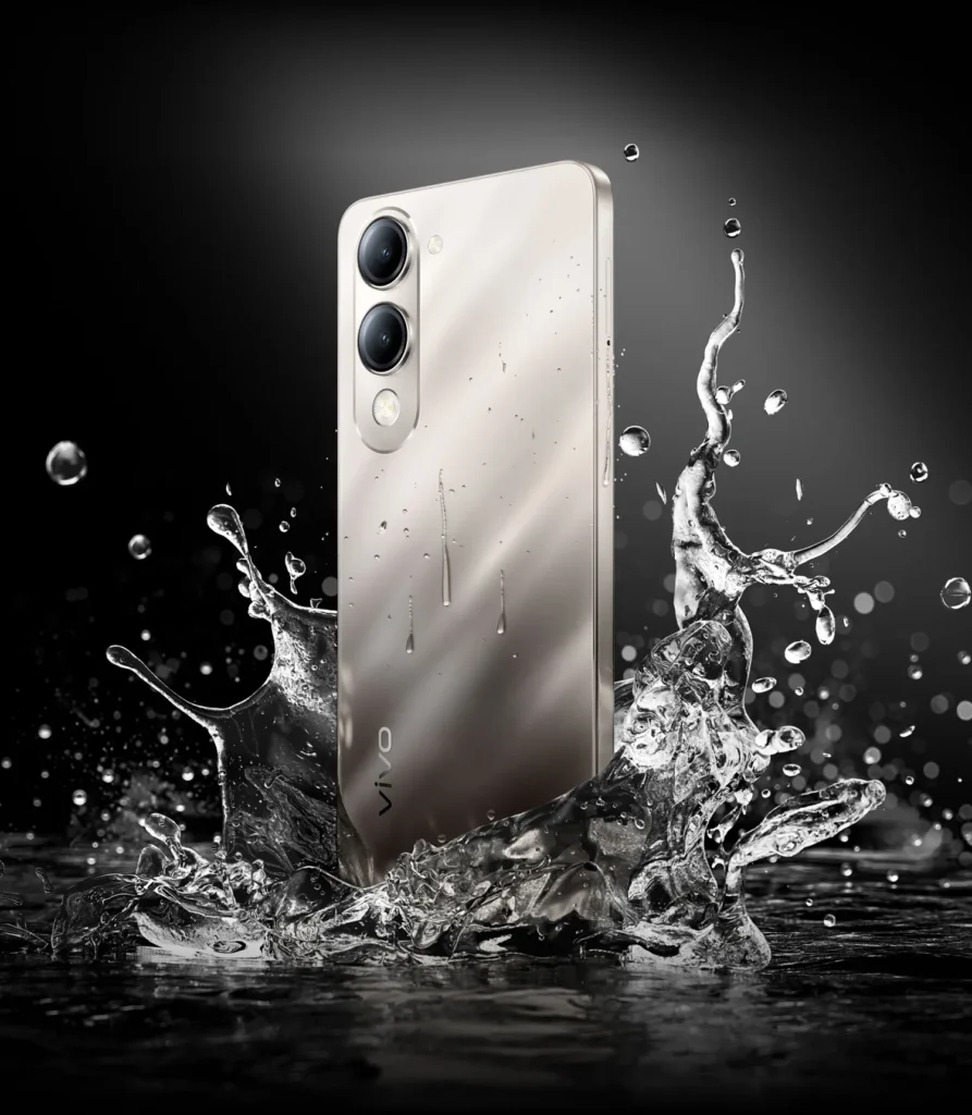 Vivo T4 Lite 5G, in Titanium Gold, with water splashing around it