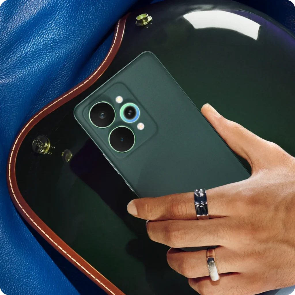 realme 15 Pro 5G, in Velvet Green, held in hand