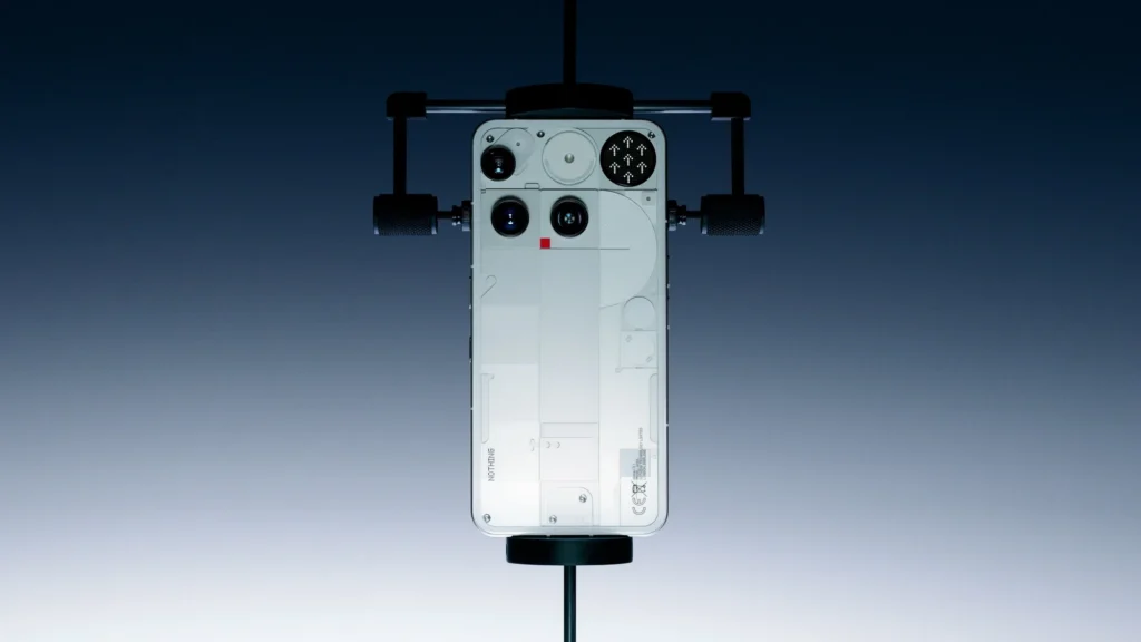 Nothing Phone (3), in White, held in a studio rig