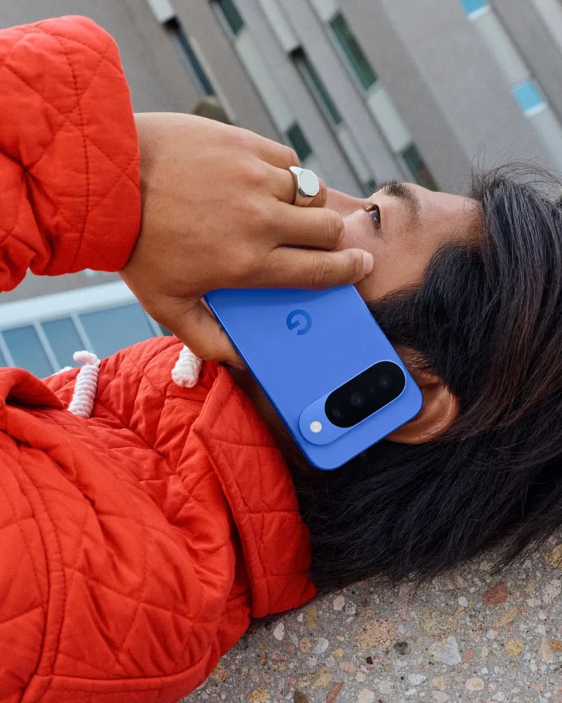 Google Pixel 10, in Indigo, held during a call