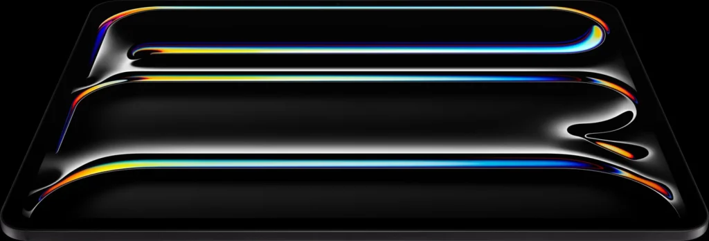 Apple iPad Pro 11″ (M5), in Space Black, lying flat at an angle