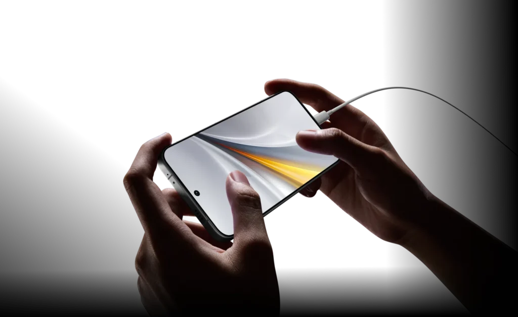 iQOO 15, held sideways while charging