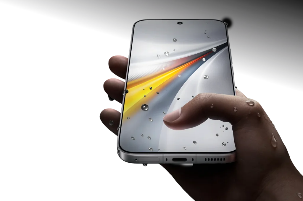 iQOO 15, held in a wet hand, water drops on the screen