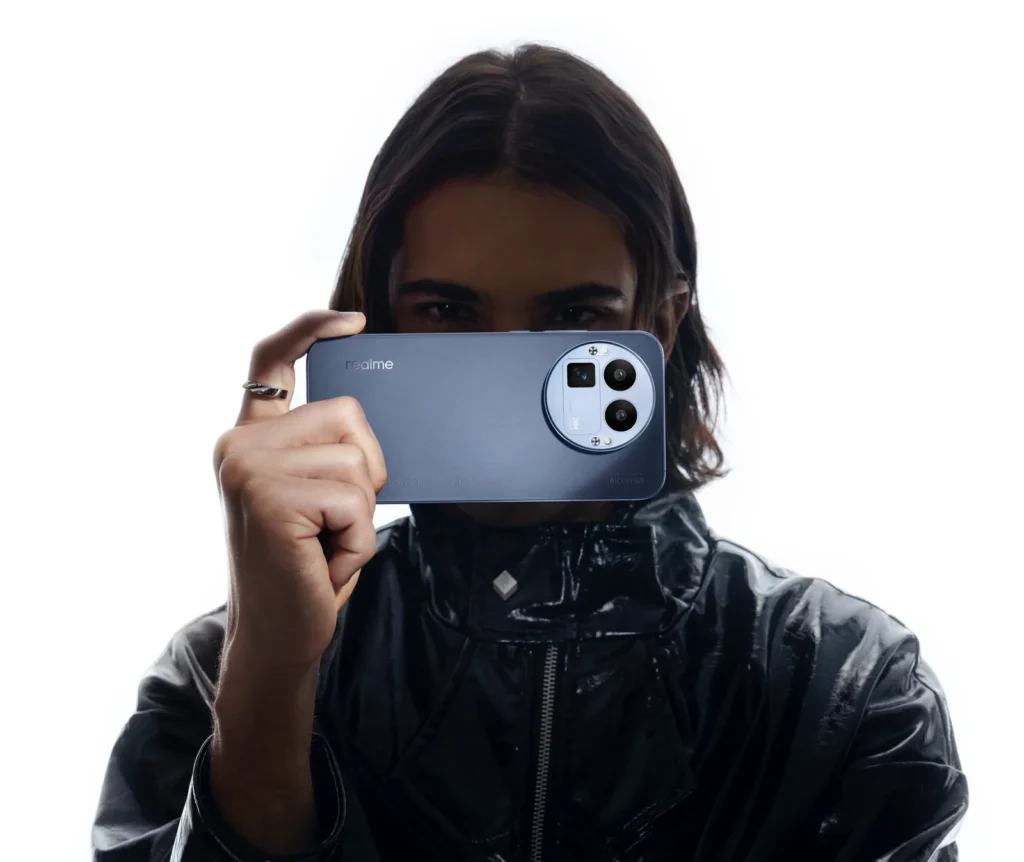 realme GT 8 Pro, in Urban Blue, held up to take a photo