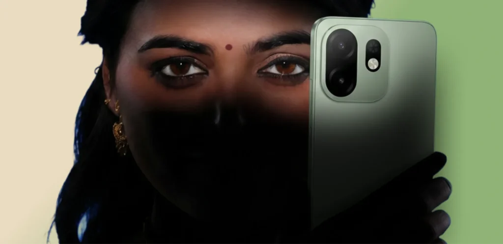 itel A100C New, in Silk Green, held up beside a face