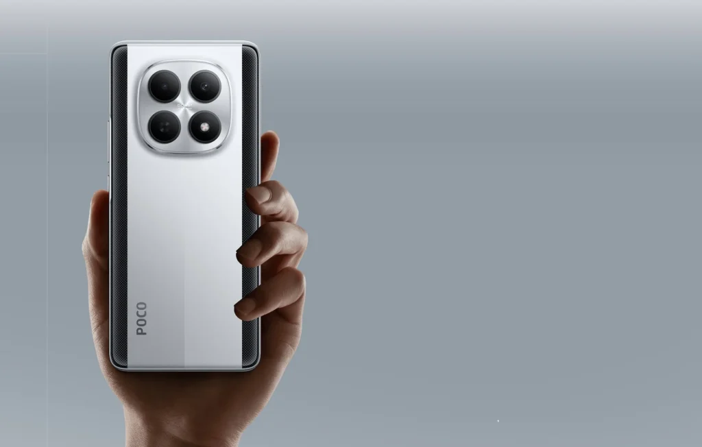 Poco M8 5G, in Frost Silver, held in one hand