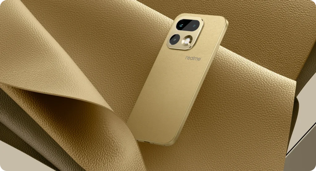 realme 16 Pro 5G, in Master Gold, on gold fabric