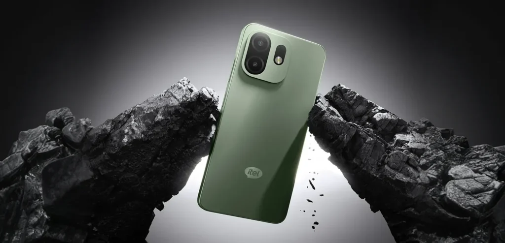 itel A100, in Silk Green between dark rocks