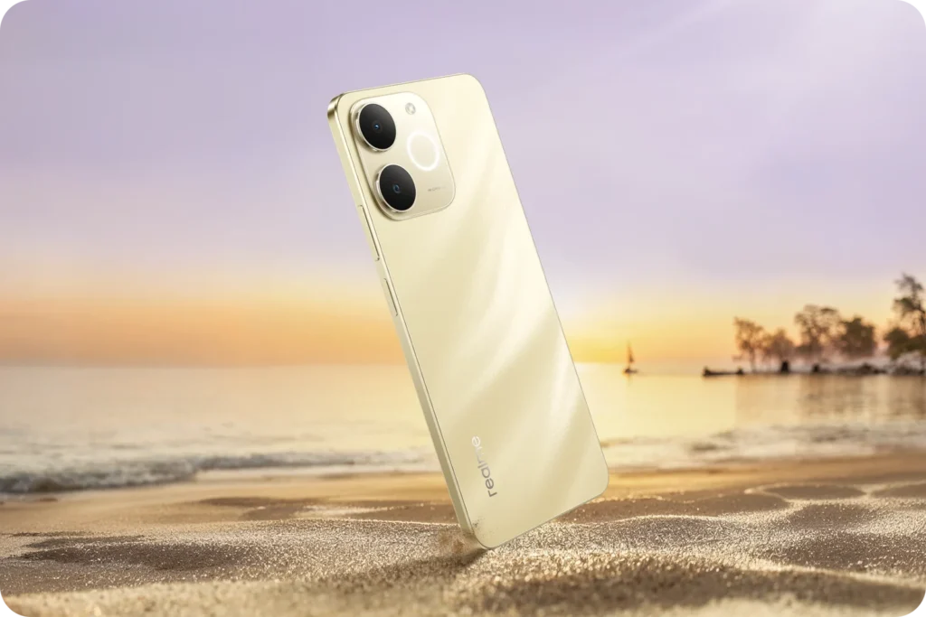 realme P4 Lite, in Beach Gold, on a beach