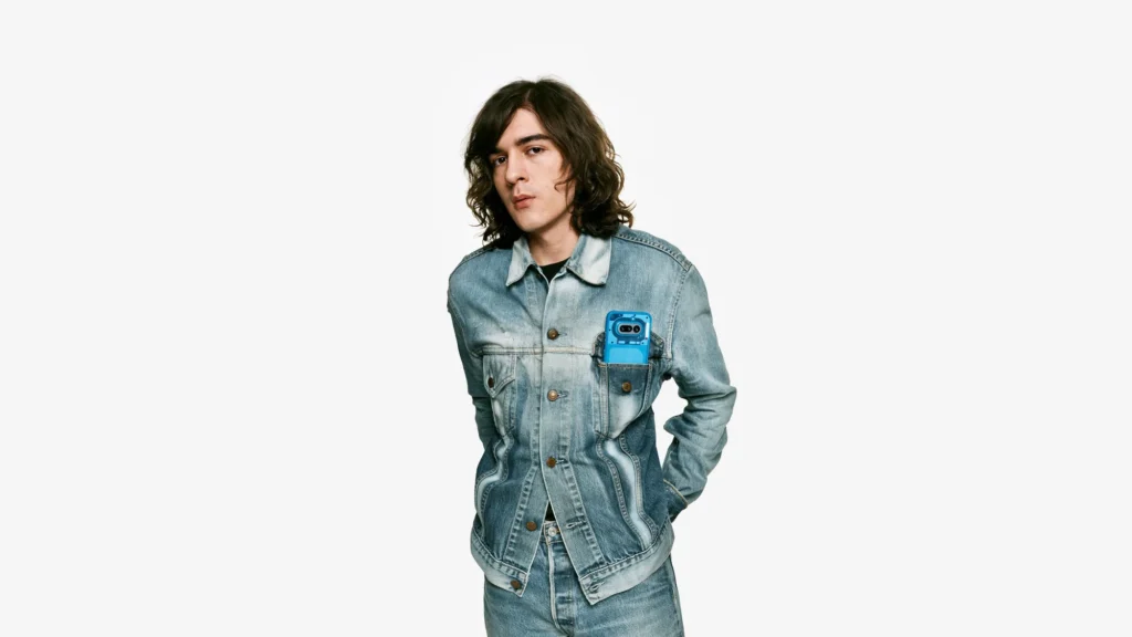 Nothing Phone (4a), in Blue, in a jacket pocket