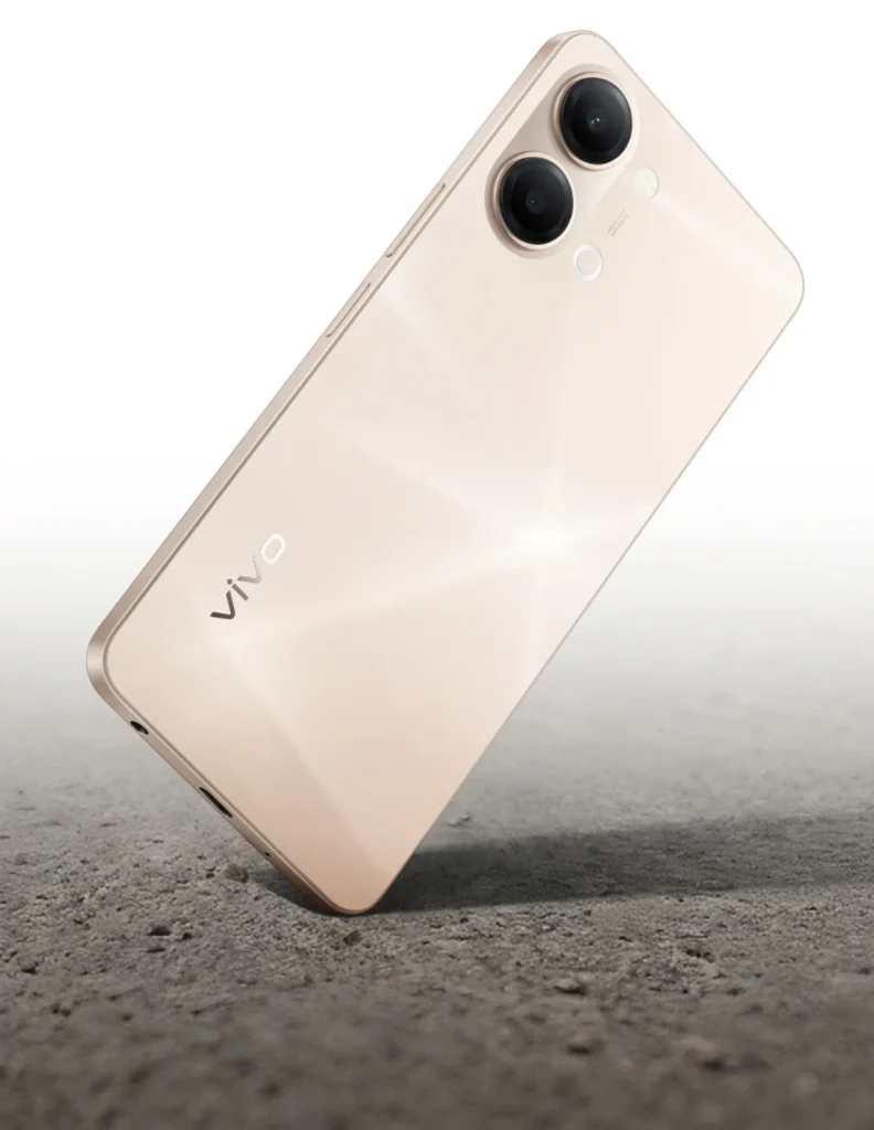 Vivo Y21 5G, in Champagne Gold, tilted on a hard floor