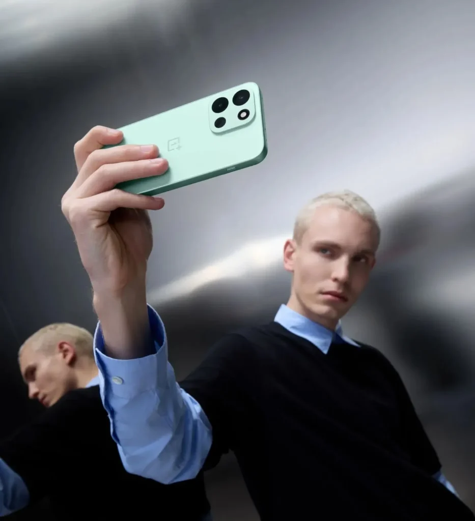 OnePlus OnePlus Nord 6, in Fresh Mint, held on a balcony