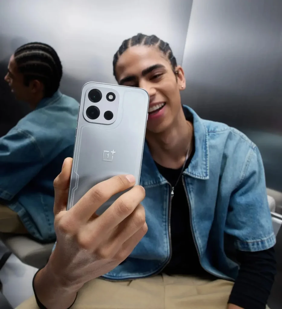 OnePlus OnePlus Nord 6, in Quick Silver, held in the hand