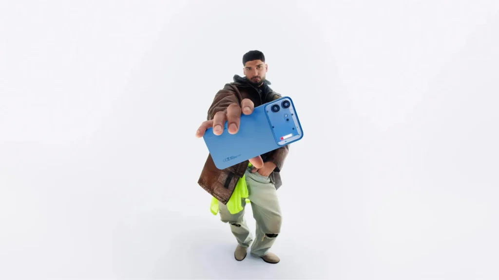 Nothing Phone (4b), in Blue, held out