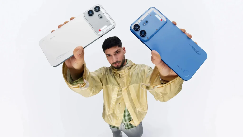 Nothing Phone (4b), in White and Blue, held in both hands