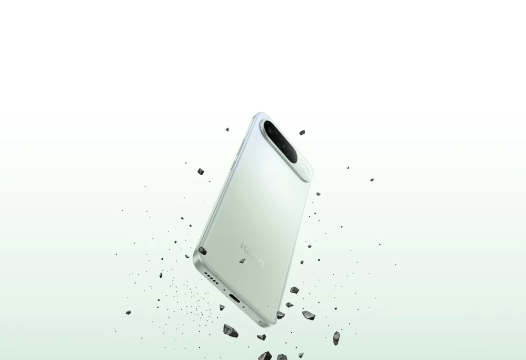 iQOO Z11, in Aurora Green, dropping through the air