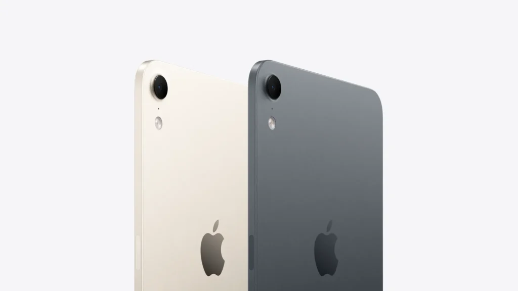 Apple iPad mini (A20 Pro), backs of Starlight and Midnight side by side, close up