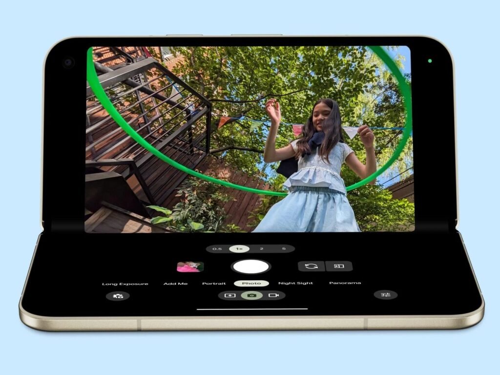 A Google Pixel 11 Pro Fold propped half open with the camera app on screen