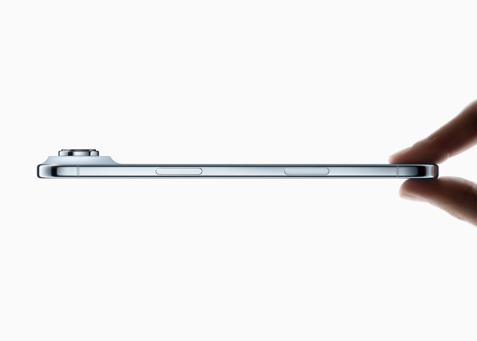 iPhone Air held between two fingers, showing its 5.64 mm profile from the side