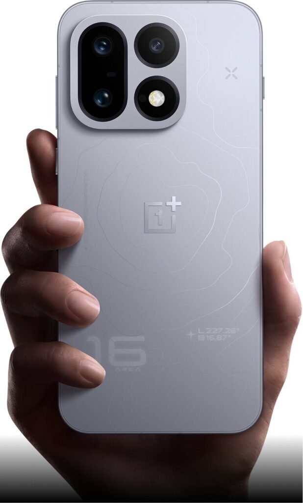 A hand holding the silver OnePlus 16 from the back