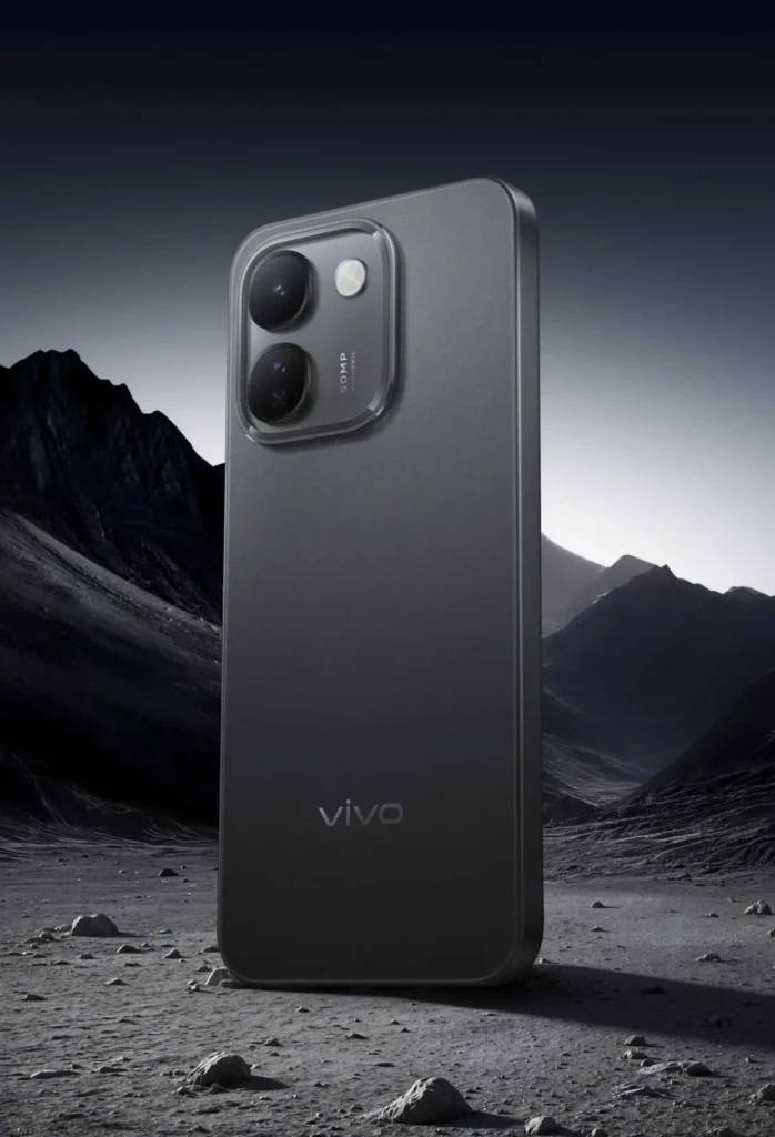 Vivo S2 FE, in Titan Black, standing among dark mountains