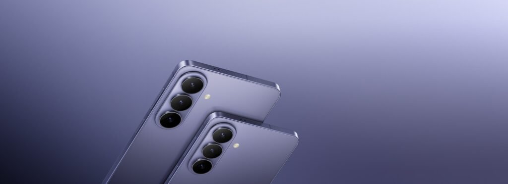 Two Samsung Galaxy S26 series phones seen from the back in purple, showing the vertical camera lenses